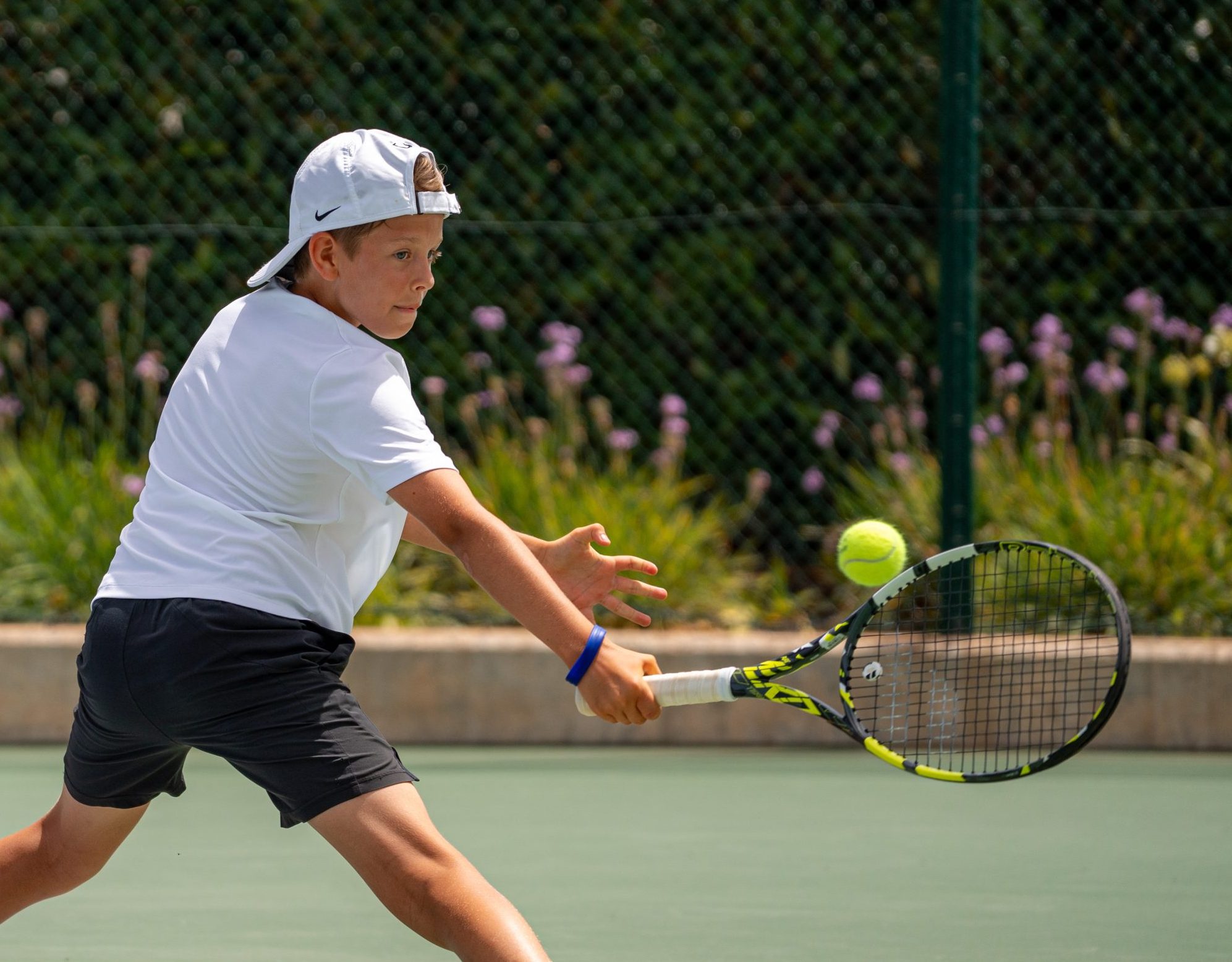 Junior tennis player during a training session
